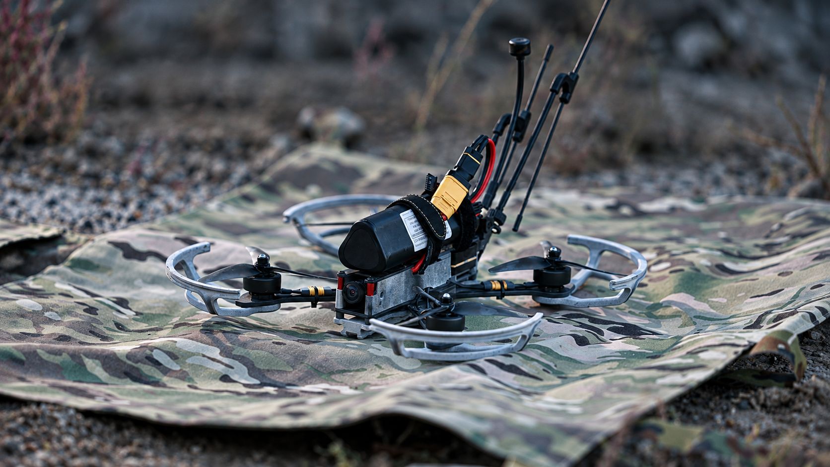 FPV drone on a camouflage mat