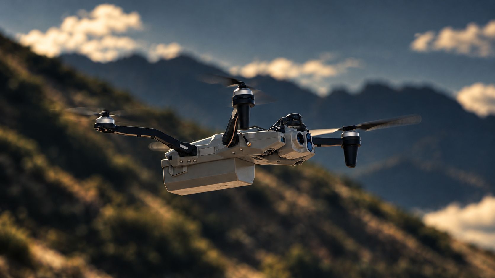 Quadcopter with payload pod in flight over a hillside